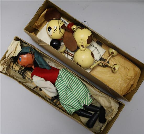 Two boxed Pelham puppets